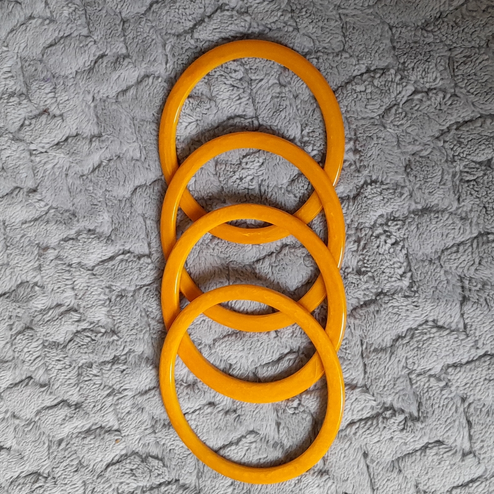 Set of four Vintage Butterscotch Swirl Bakelite spacer Bracelets